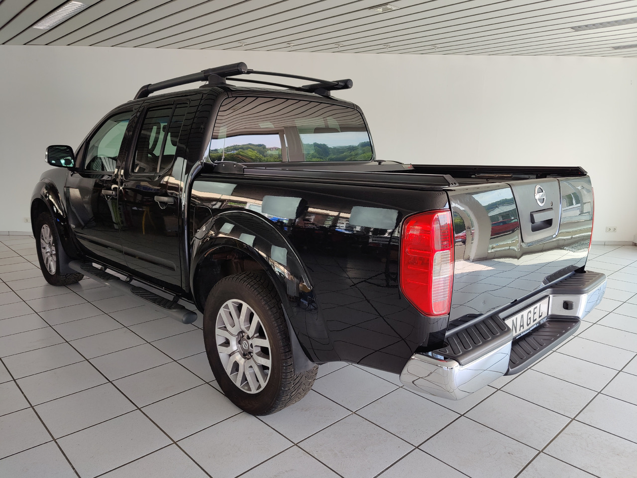 Nissan Navara Pickup (D40M)(05.2005->) Double Cab LE V6 4X4 Navi Kam Leder SHZ AHK - Pick-up: das Bild 4 Nissan Navara Pickup (D40M)(05.2005->) Double Cab LE V6 4X4 Navi Kam Leder SHZ AHK - Pick-up: das Bild 4