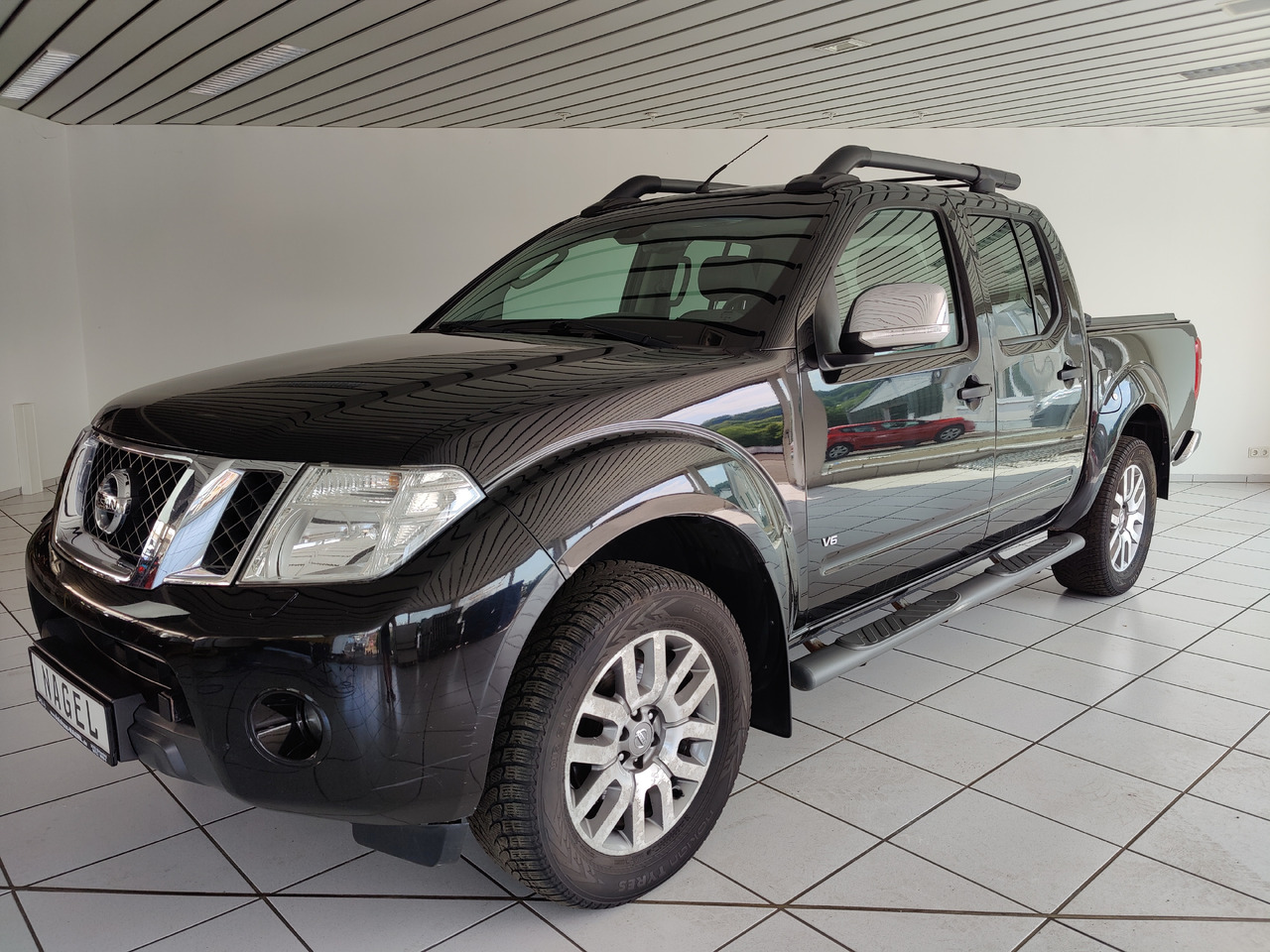 Nissan Navara Pickup (D40M)(05.2005->) Double Cab LE V6 4X4 Navi Kam Leder SHZ AHK - Pick-up: das Bild 1 Nissan Navara Pickup (D40M)(05.2005->) Double Cab LE V6 4X4 Navi Kam Leder SHZ AHK - Pick-up: das Bild 1