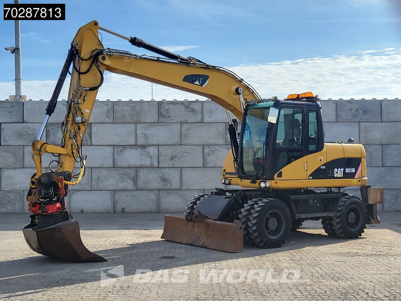 Caterpillar M313 D OUTRIGGERS + BLADE - Mobilbagger: das Bild 2 Caterpillar M313 D OUTRIGGERS + BLADE - Mobilbagger: das Bild 2