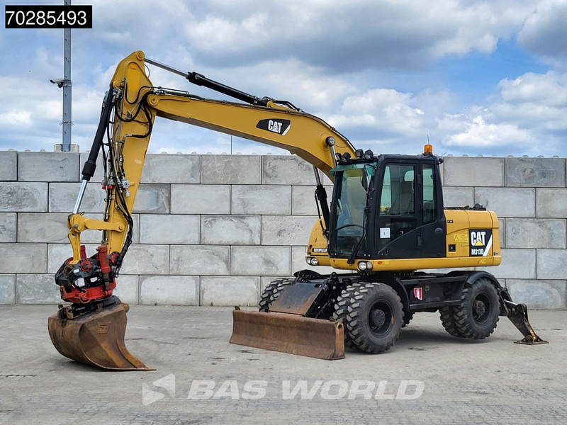 Caterpillar M313 D OUTRIGGERS + ROTOTILT - Mobilbagger: das Bild 2 Caterpillar M313 D OUTRIGGERS + ROTOTILT - Mobilbagger: das Bild 2