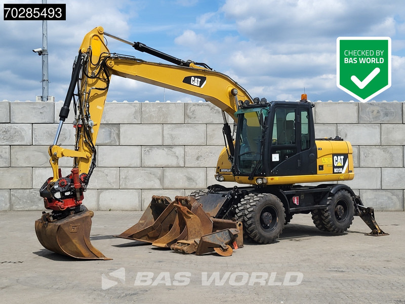Caterpillar M313 D OUTRIGGERS + ROTOTILT - Mobilbagger: das Bild 1 Caterpillar M313 D OUTRIGGERS + ROTOTILT - Mobilbagger: das Bild 1