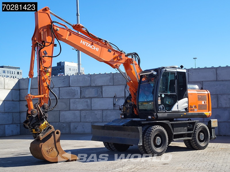 Hitachi ZX140W -5 OUTRIGGERS + BLADE - Mobilbagger: das Bild 2 Hitachi ZX140W -5 OUTRIGGERS + BLADE - Mobilbagger: das Bild 2