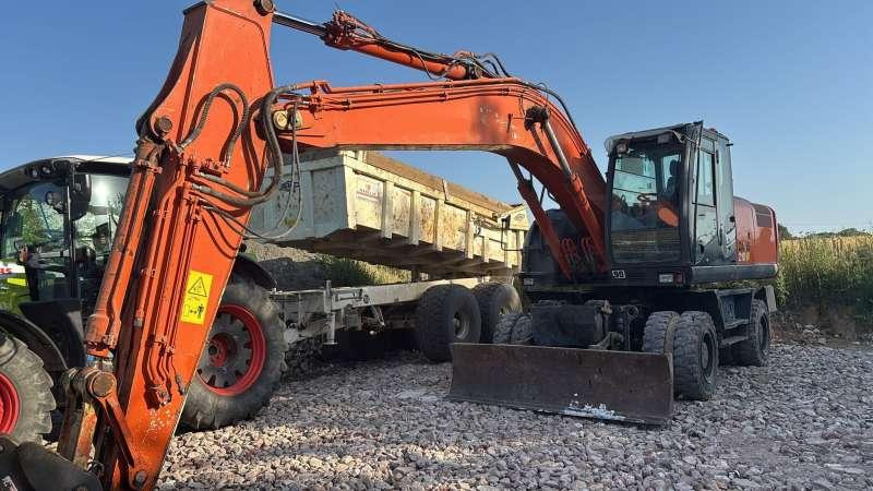 Hitachi Pelle Sur Pneus Hitachi ZX 210 W-3 - Mobilbagger: das Bild 2 Hitachi Pelle Sur Pneus Hitachi ZX 210 W-3 - Mobilbagger: das Bild 2