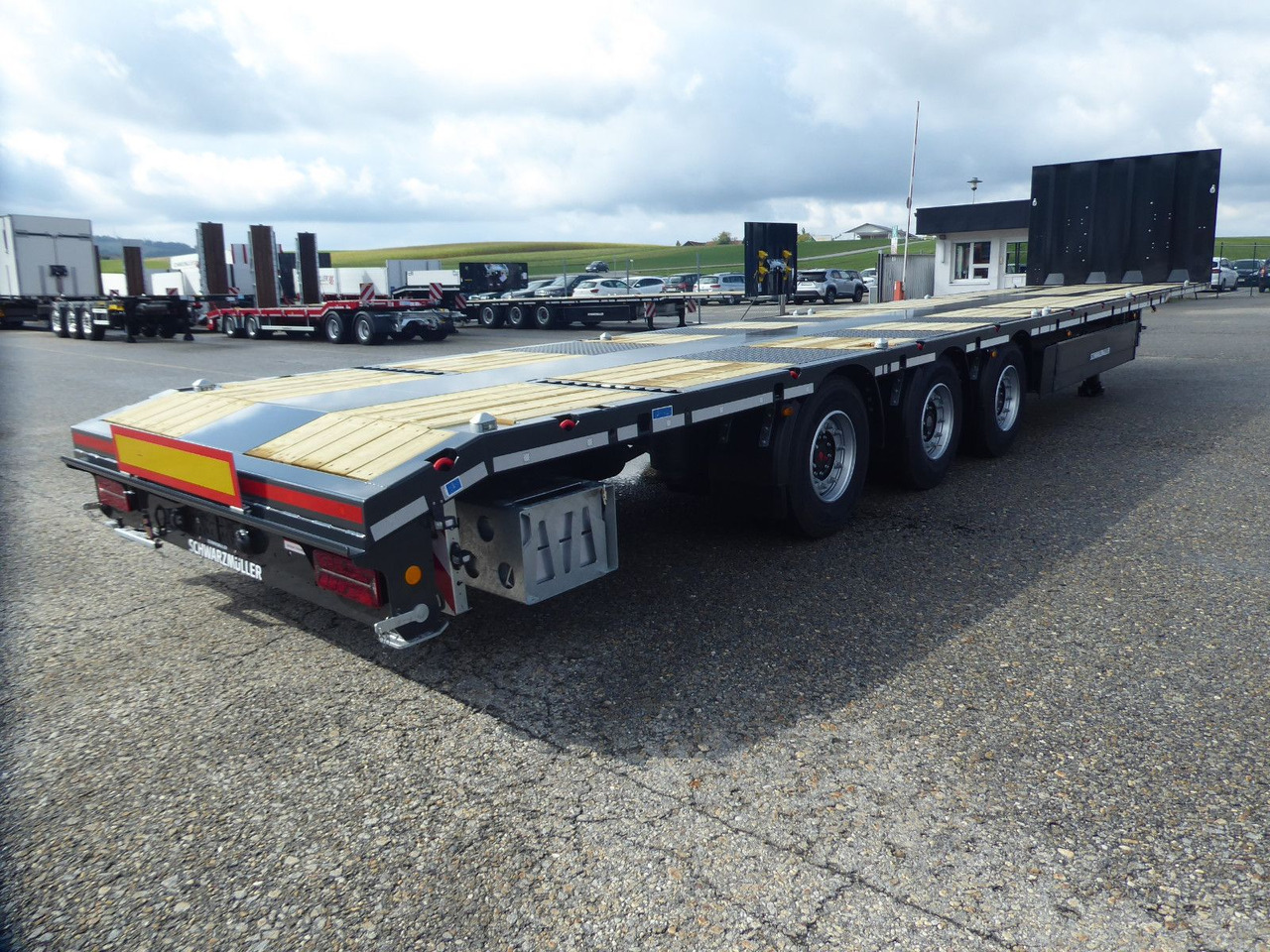 Schwarzmüller 3Achs Tele Rampen TwistLock40+2x20"SAF Lenk+Lift - Pritschenauflieger/ Plattformauflieger: das Bild 4 Schwarzmüller 3Achs Tele Rampen TwistLock40+2x20"SAF Lenk+Lift - Pritschenauflieger/ Plattformauflieger: das Bild 4