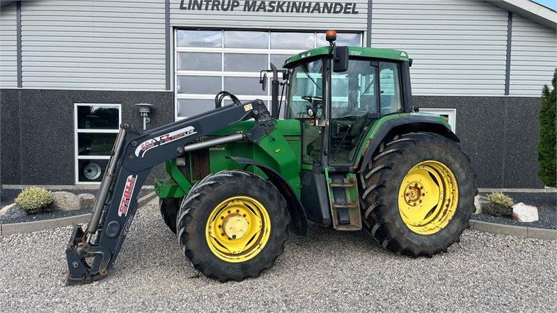 John Deere 6910 Auto Quad II-TLS Med frontlæsser - Traktor: das Bild 1 John Deere 6910 Auto Quad II-TLS Med frontlæsser - Traktor: das Bild 1