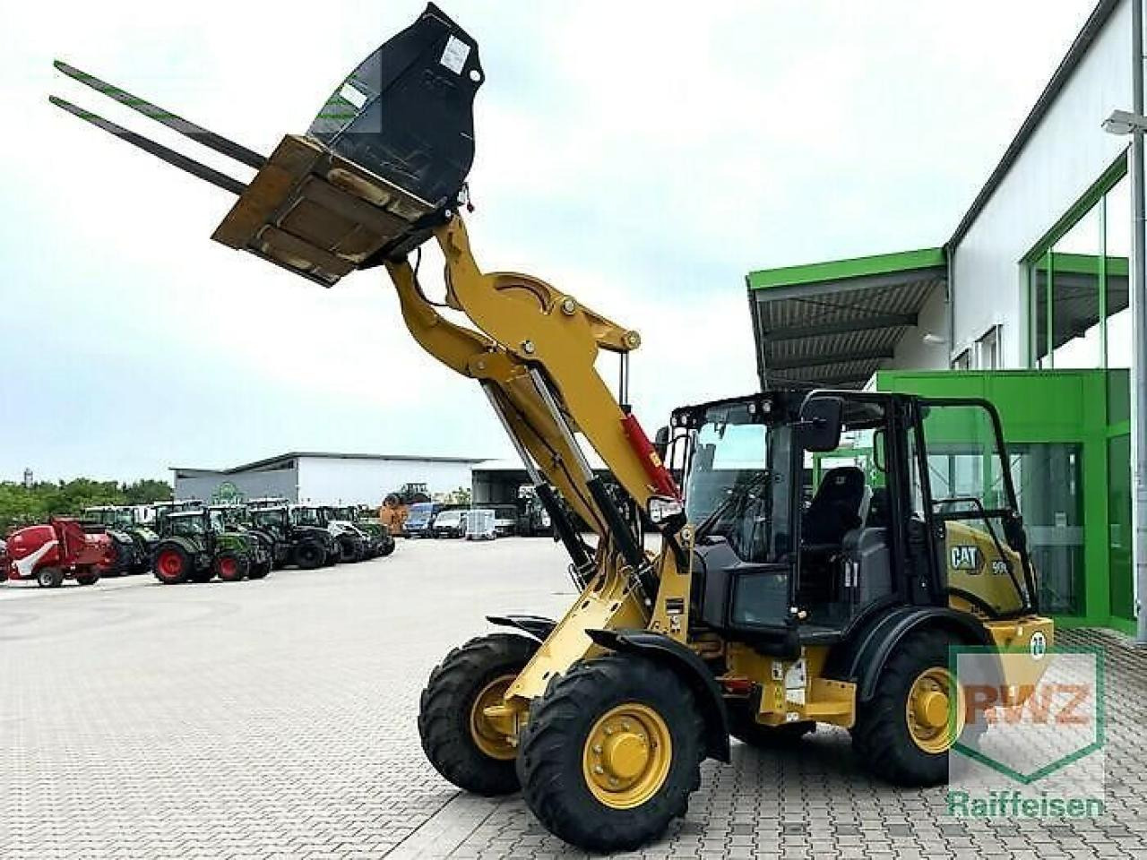 Caterpillar 906 radlader - Minibagger: das Bild 1 Caterpillar 906 radlader - Minibagger: das Bild 1
