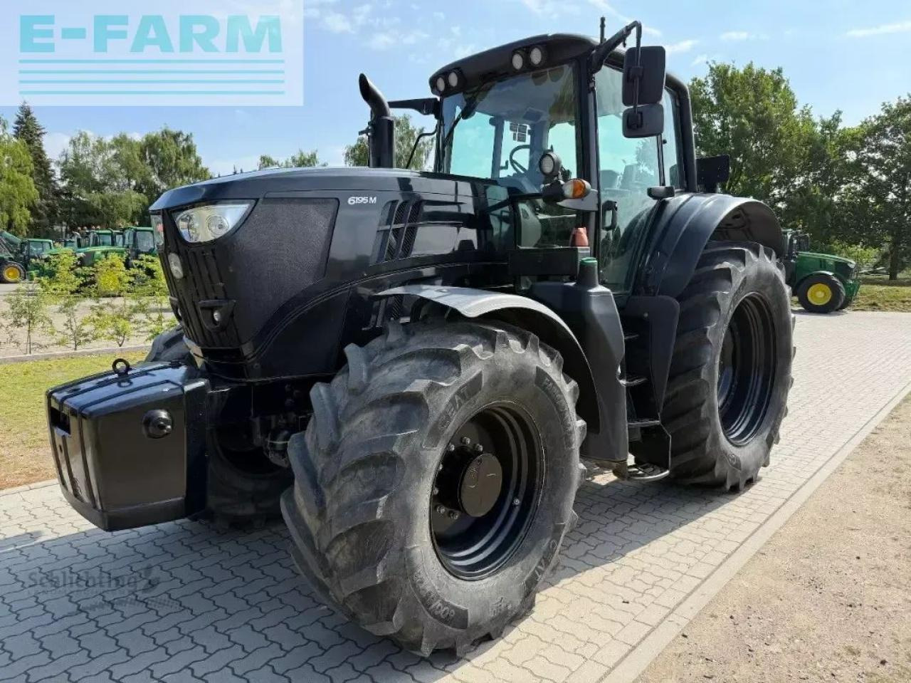 John Deere 6195m - Traktor: das Bild 1 John Deere 6195m - Traktor: das Bild 1