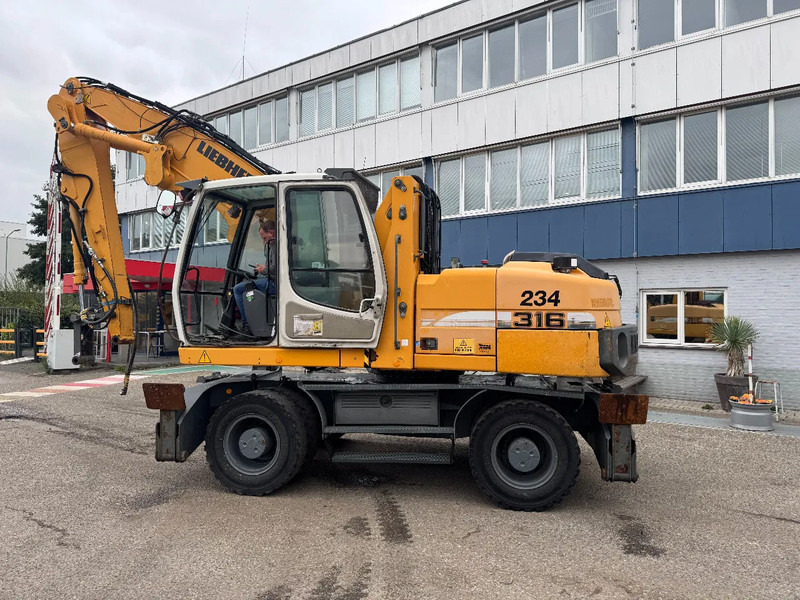 Liebherr A 316 LITRONIC CABIN HIGH CE - Umschlagbagger: das Bild 3 Liebherr A 316 LITRONIC CABIN HIGH CE - Umschlagbagger: das Bild 3