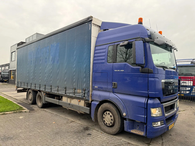 MAN TGX 26.400 6X2 - EURO 4 + LIFT + STEERING AXLE - Plane LKW: das Bild 3 MAN TGX 26.400 6X2 - EURO 4 + LIFT + STEERING AXLE - Plane LKW: das Bild 3