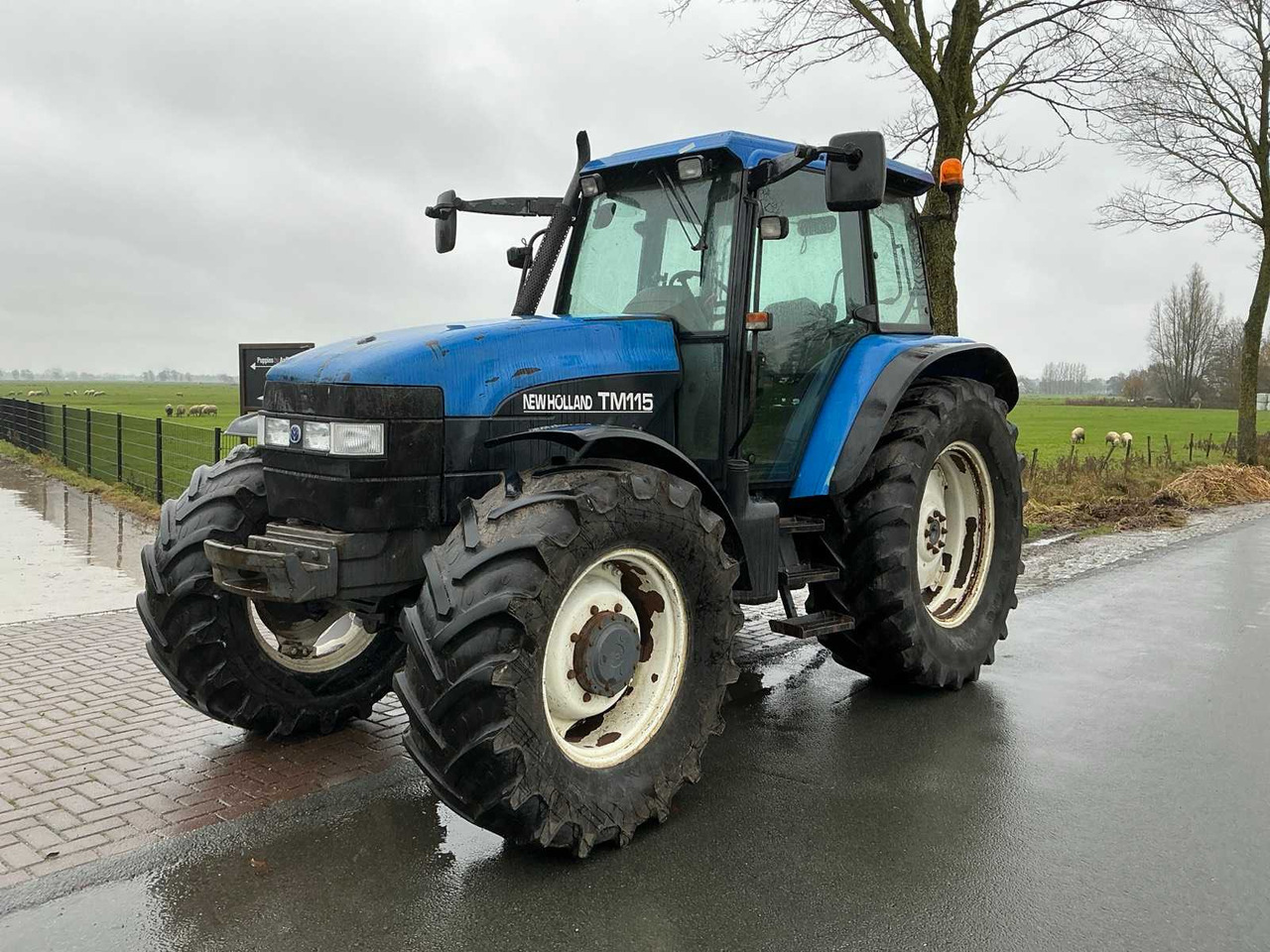 2002 NEW HOLLAND TM 115 ALL-WHEEL DRIVE FARM TRACTOR - Traktor: das Bild 1 2002 NEW HOLLAND TM 115 ALL-WHEEL DRIVE FARM TRACTOR - Traktor: das Bild 1