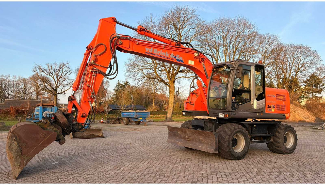 2009 HITACHI ZX140W-3 WHEELED EXCAVATOR - Mobilbagger: das Bild 1 2009 HITACHI ZX140W-3 WHEELED EXCAVATOR - Mobilbagger: das Bild 1