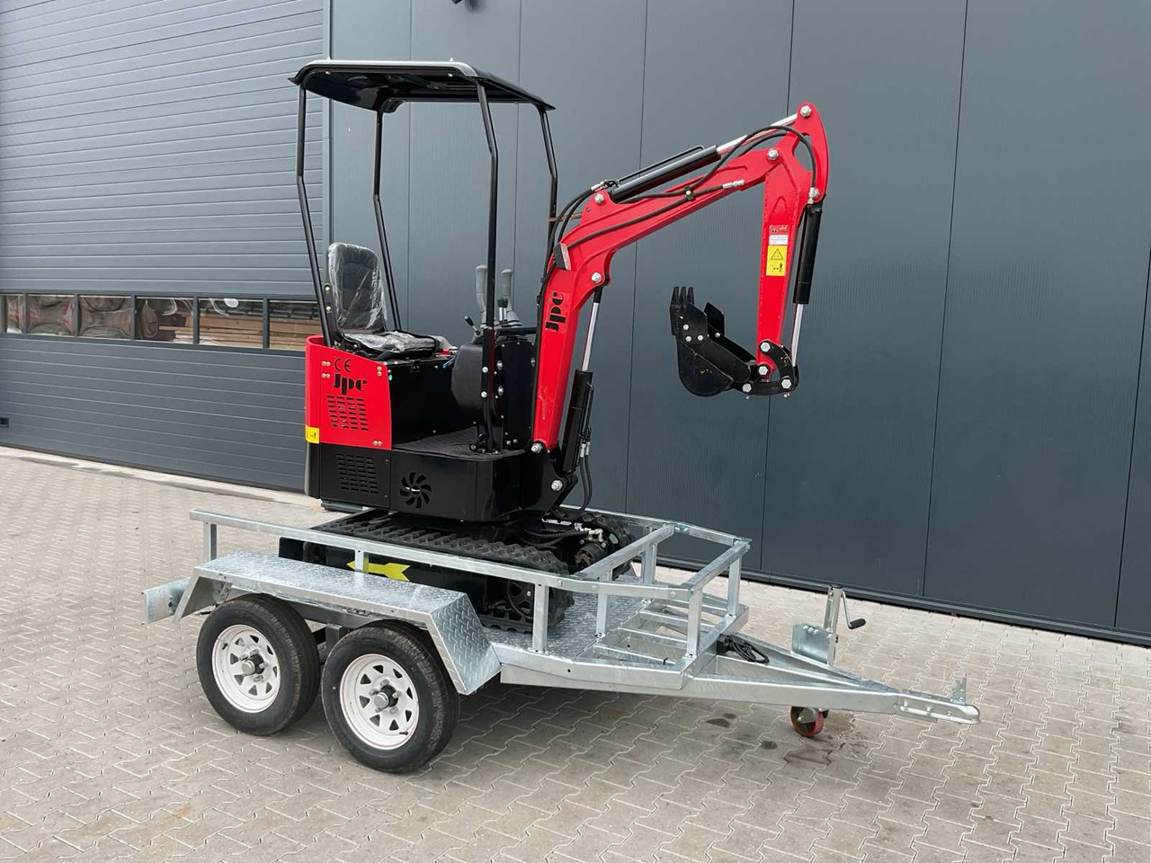 JPC HT12 met aanhangwagen - Baggerlader: das Bild 1 JPC HT12 met aanhangwagen - Baggerlader: das Bild 1