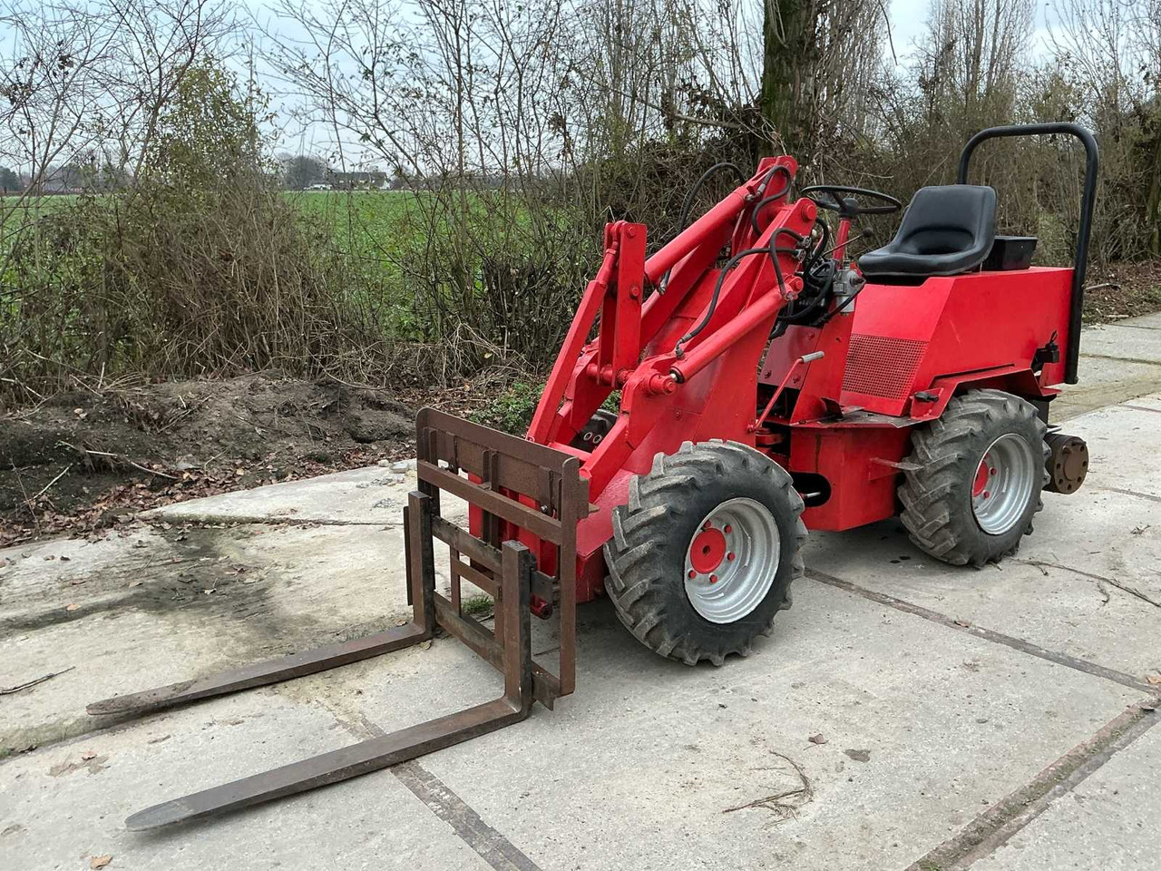 WEIDEMANN 917 SHOVEL - BUCKET - FORKS AND CLAMP - Radlader: das Bild 1 WEIDEMANN 917 SHOVEL - BUCKET - FORKS AND CLAMP - Radlader: das Bild 1