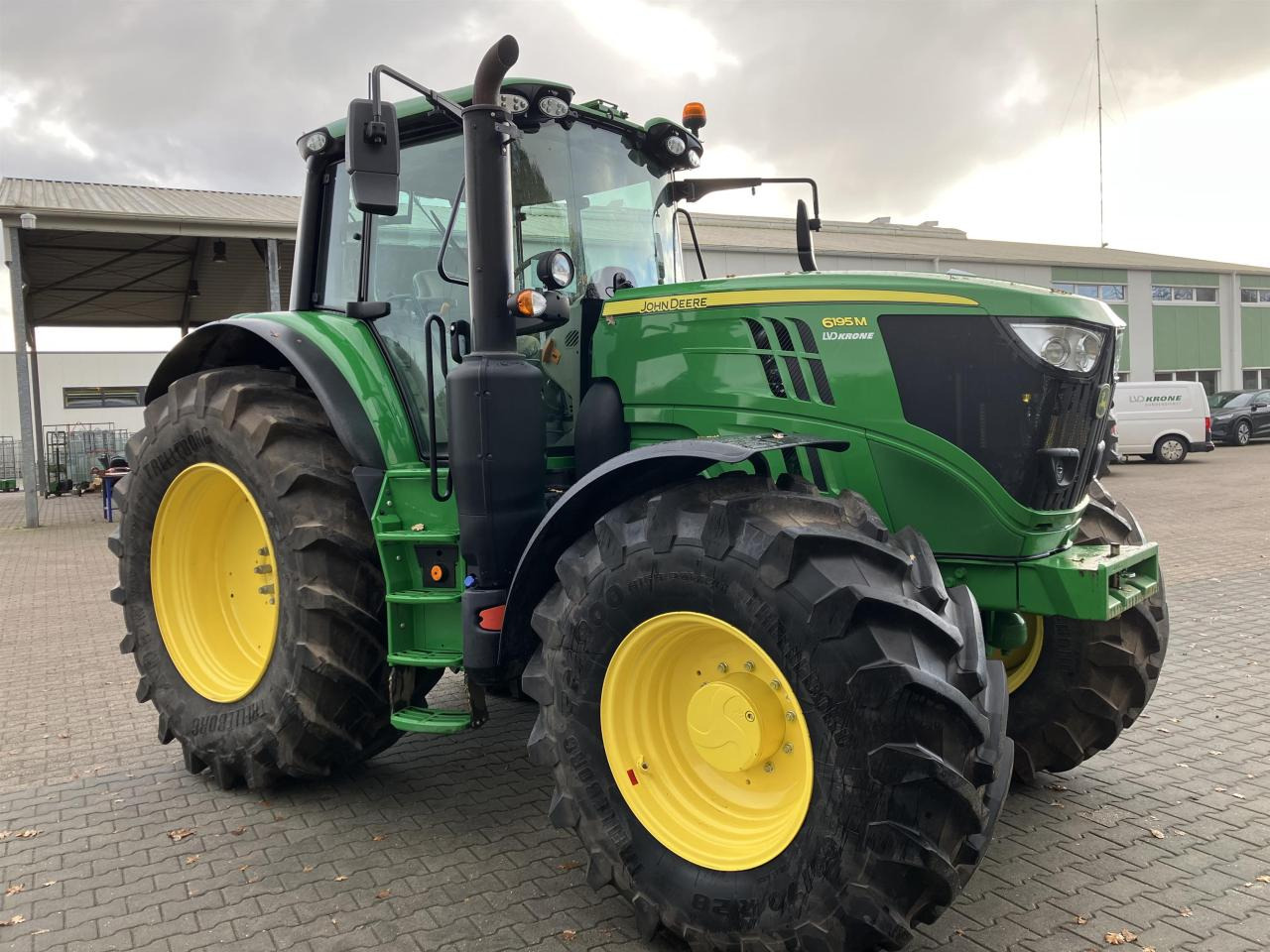 John Deere 6195M - Traktor: das Bild 1 John Deere 6195M - Traktor: das Bild 1