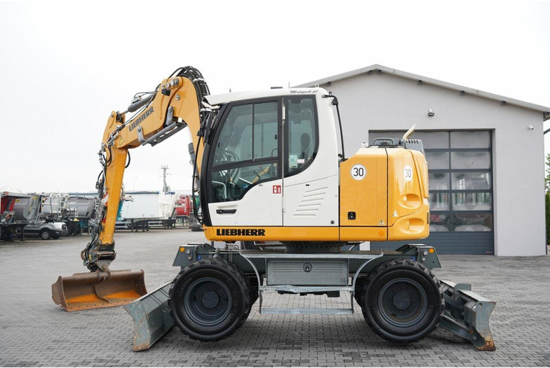 Liebherr 910 COMPACT LITRONIC / KOPARKA KOŁOWA / KLIMATYZACJA / KAMERA - Mobilbagger: das Bild 2 Liebherr 910 COMPACT LITRONIC / KOPARKA KOŁOWA / KLIMATYZACJA / KAMERA - Mobilbagger: das Bild 2