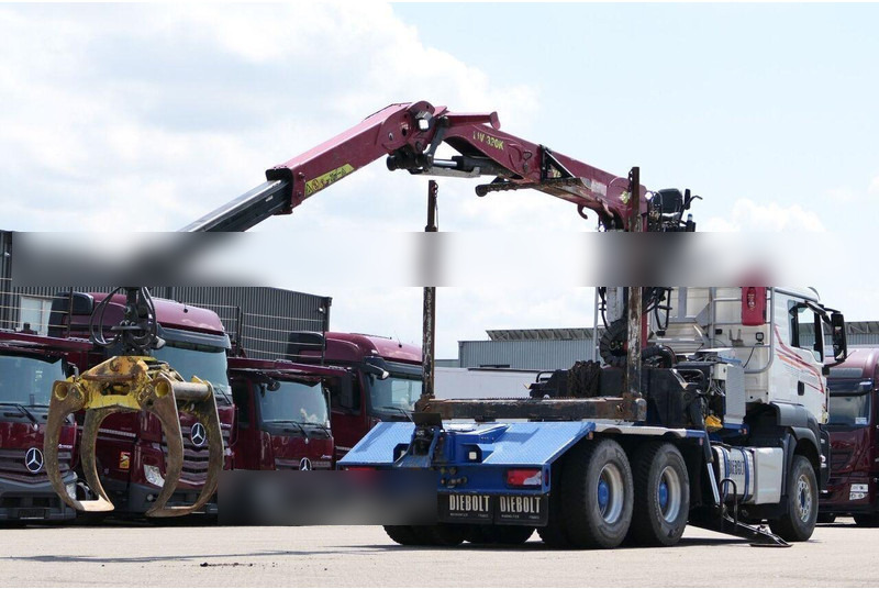 MAN TGS 33.500 - Timper truck+crane - Holztransporter, Autokran: das Bild 3 MAN TGS 33.500 - Timper truck+crane - Holztransporter, Autokran: das Bild 3