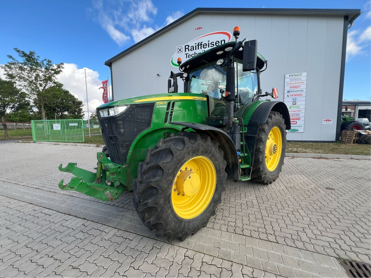 John Deere 7310 R - Traktor: das Bild 1 John Deere 7310 R - Traktor: das Bild 1