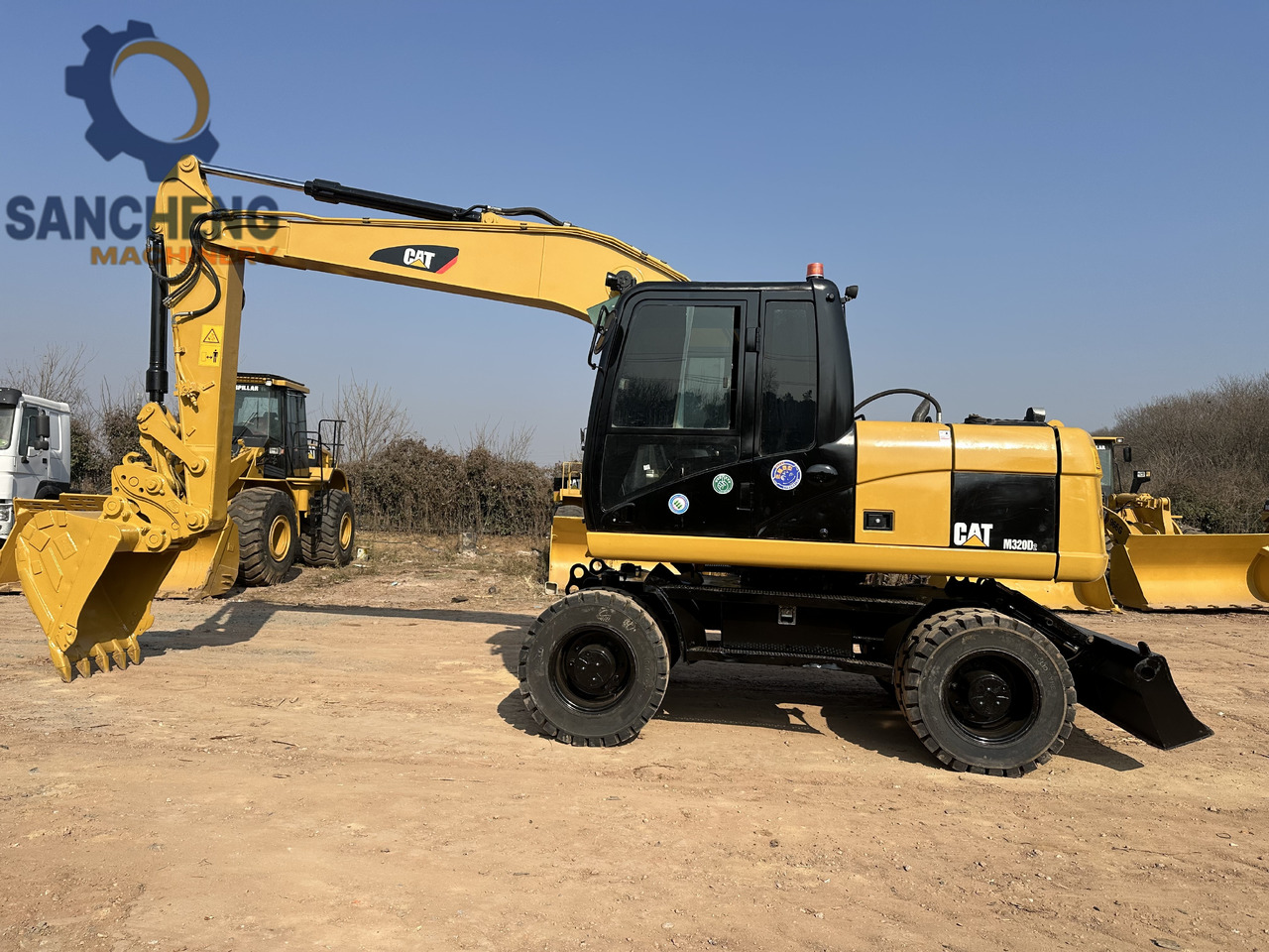 CATERPILLAR M320D2 - Mobilbagger: das Bild 2 CATERPILLAR M320D2 - Mobilbagger: das Bild 2