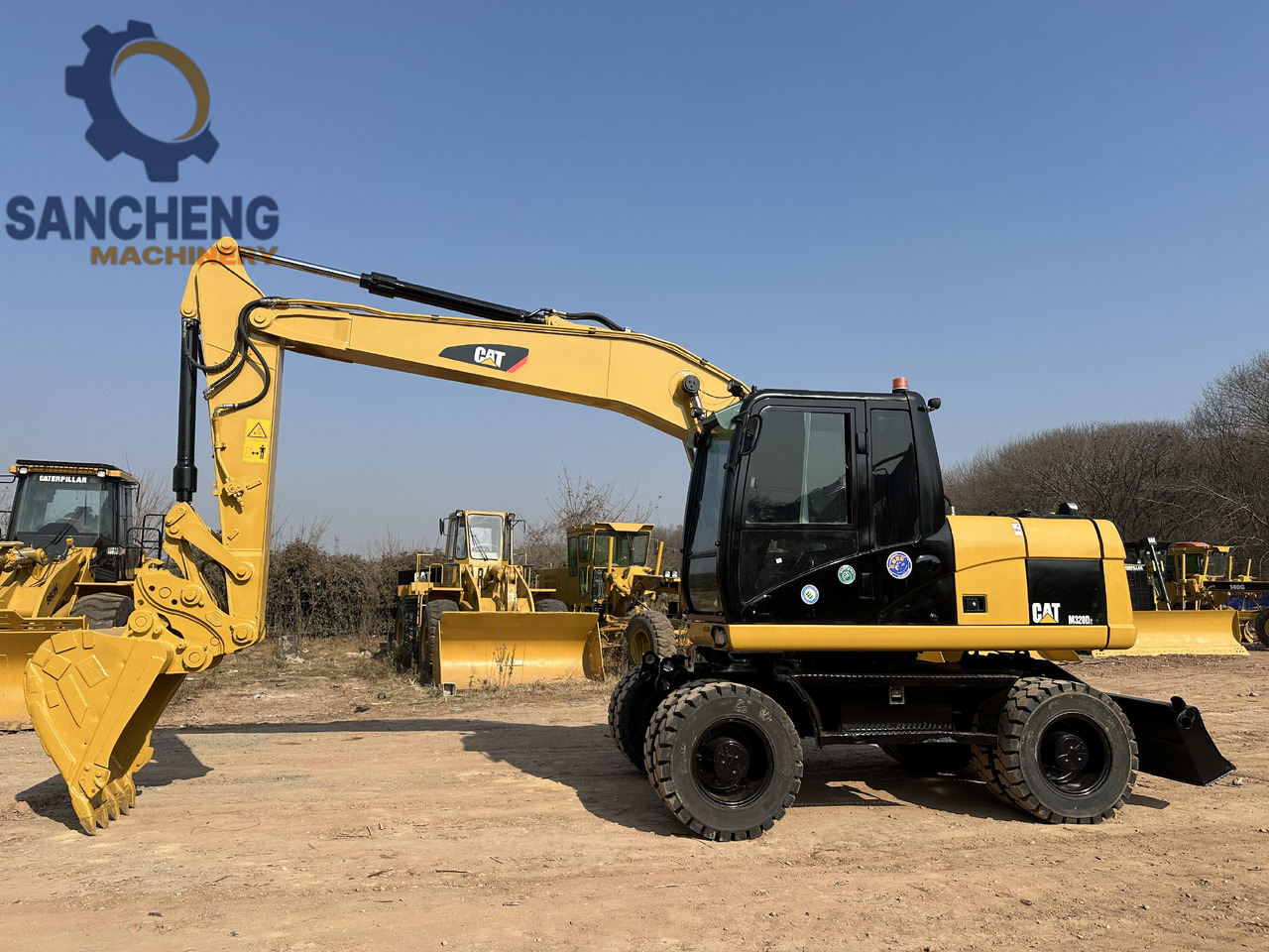 CATERPILLAR M320D2 - Mobilbagger: das Bild 5 CATERPILLAR M320D2 - Mobilbagger: das Bild 5