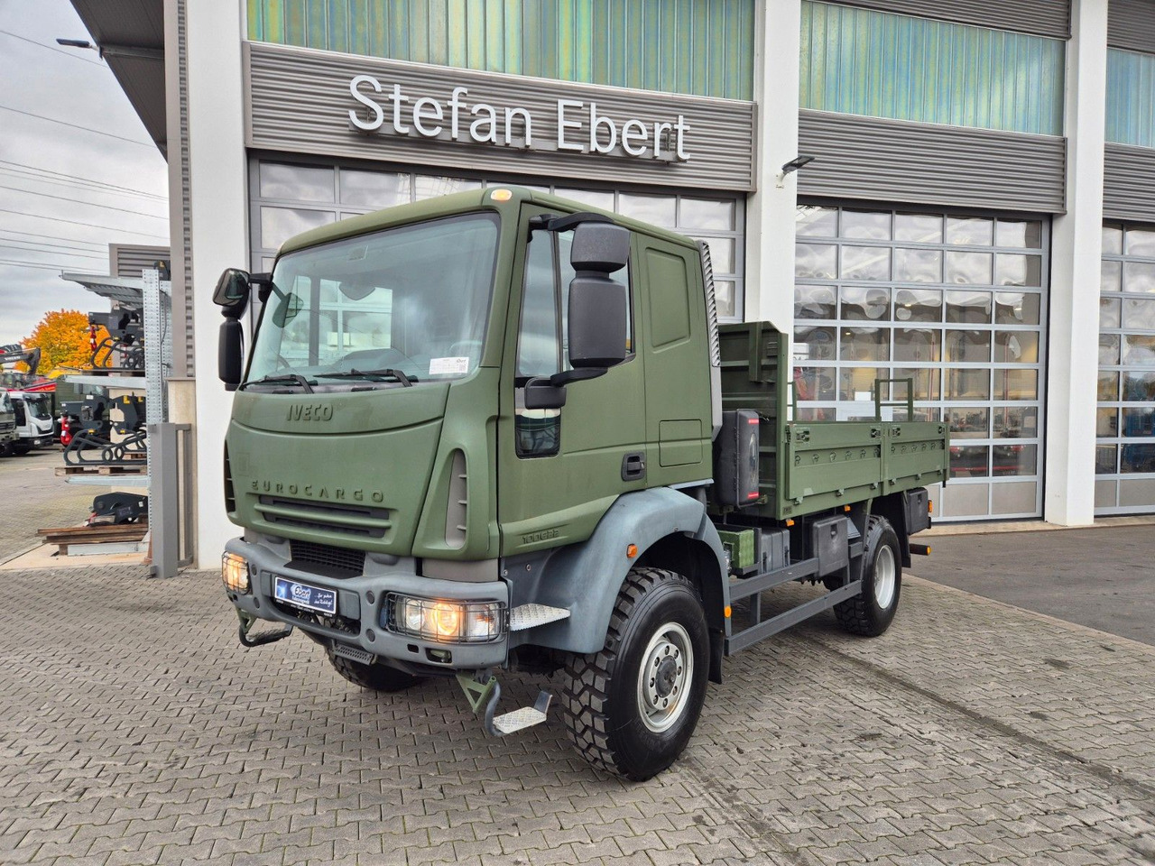 Iveco Eurocargo ML100E22WM-BW 4x4 Pritsche L-Haus Bett - Pritsche LKW: das Bild 1 Iveco Eurocargo ML100E22WM-BW 4x4 Pritsche L-Haus Bett - Pritsche LKW: das Bild 1