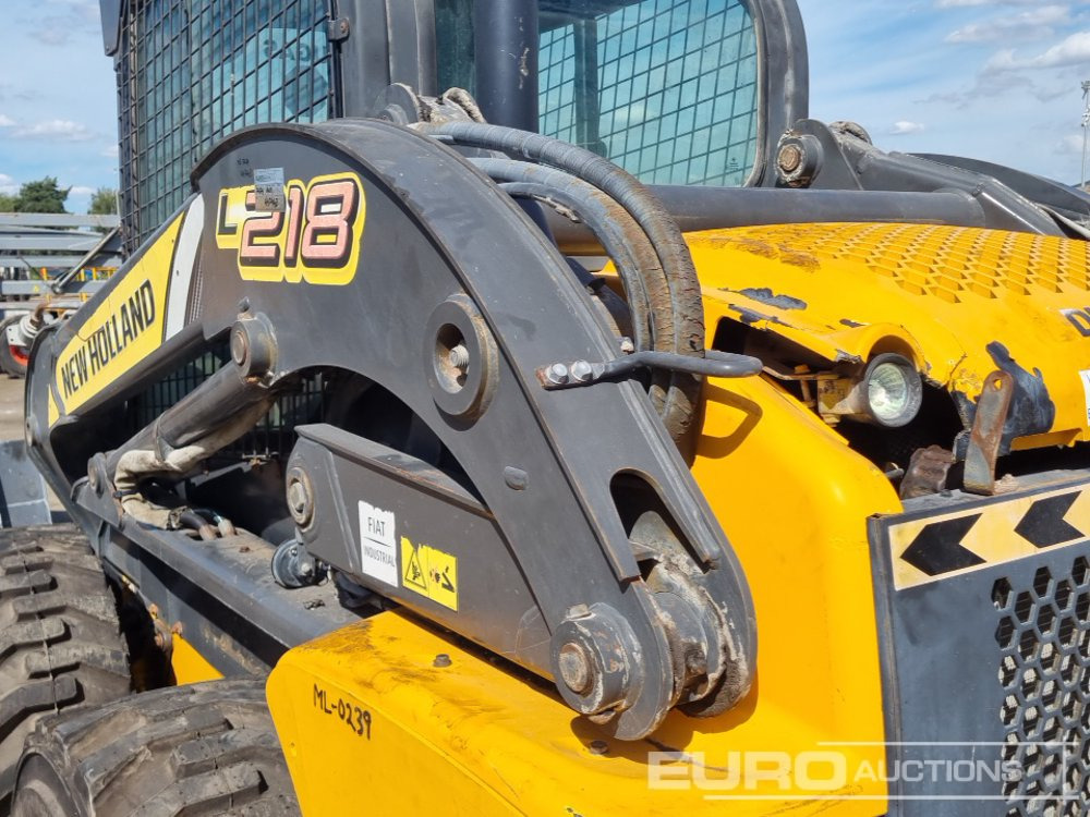 Kompaktlader 2012 New Holland L218: das Bild 36