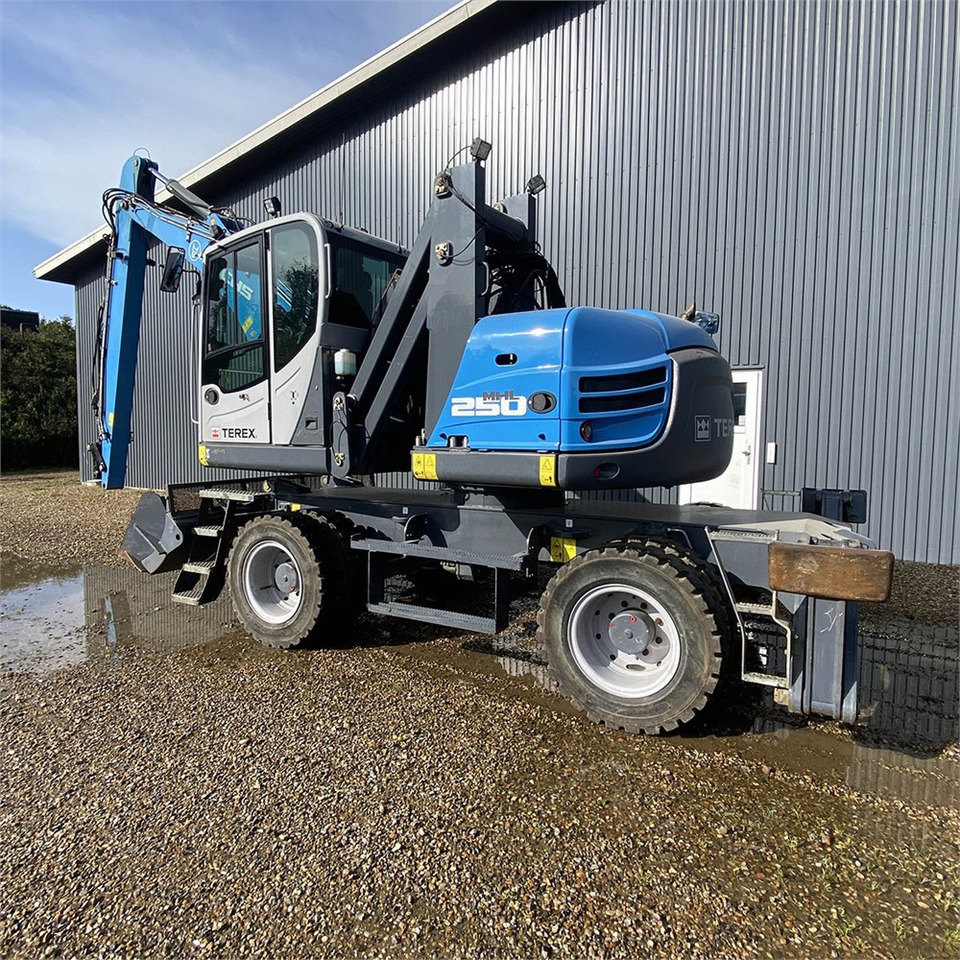 Fuchs MHL 250 - Umschlagbagger: das Bild 3 Fuchs MHL 250 - Umschlagbagger: das Bild 3