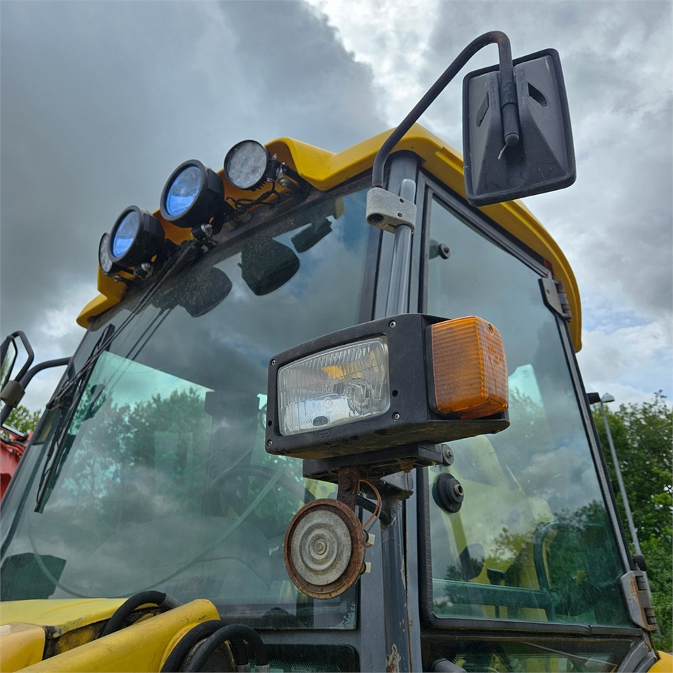 Baggerlader New Holland LB115-4PS: das Bild 26