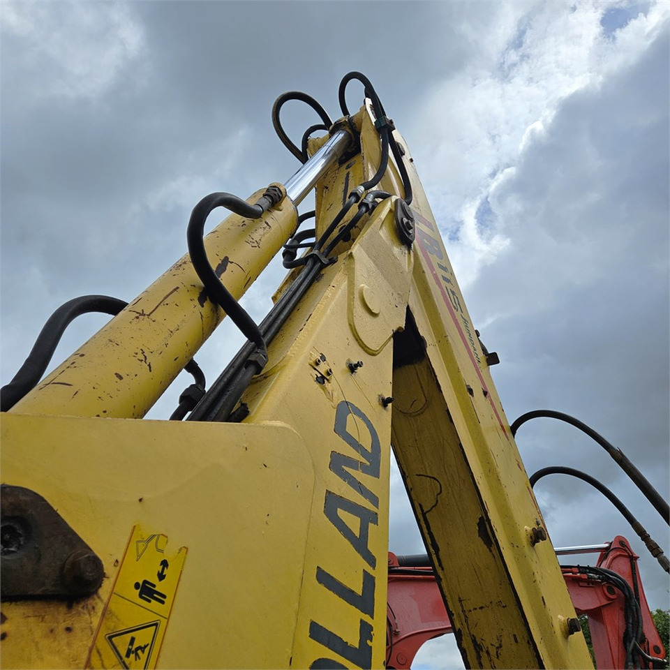 Baggerlader New Holland LB115-4PS: das Bild 35