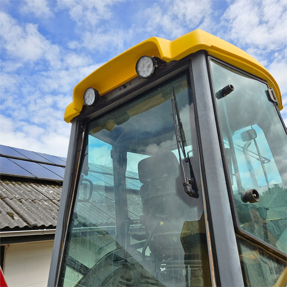 Baggerlader New Holland LB115-4PS: das Bild 29